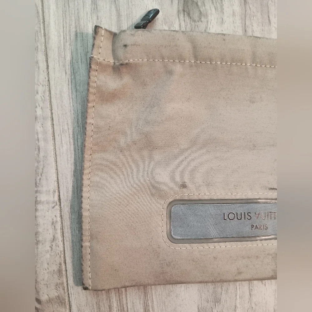 LOUIS VUITTON Truth Voyage Pouch Beige Monogram Polyester